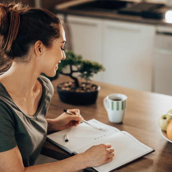 Woman scheduling regular maintenance cleanings in Longview WA with PUIRI.